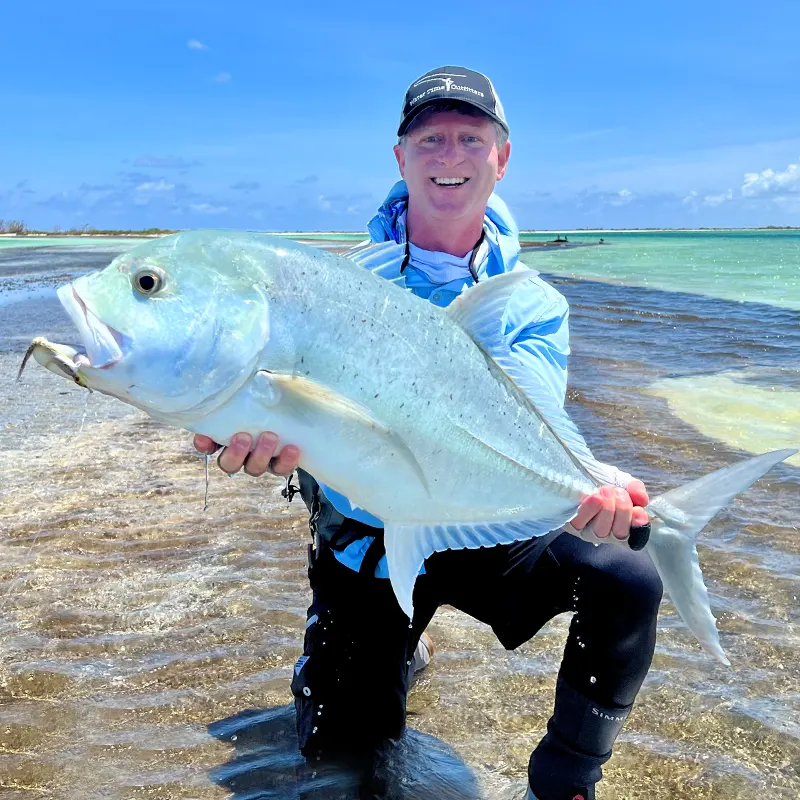 Adam with a large Christmas Island giant trevally