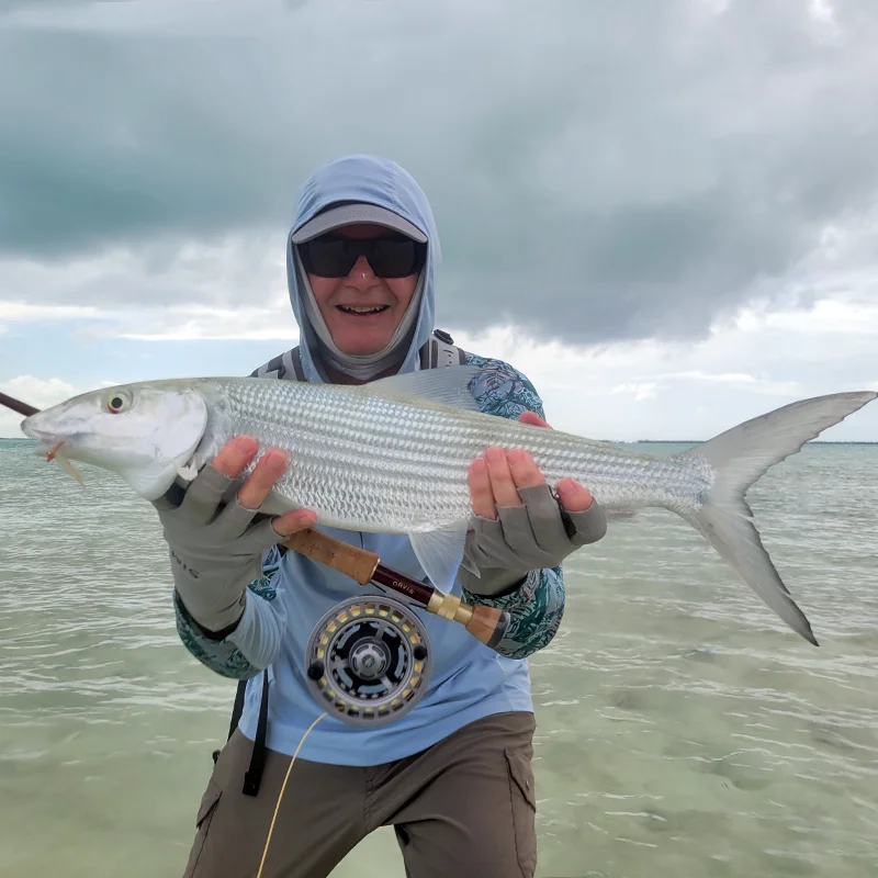 Thor with a large bonefish during 2023 hosted week at The Villages on Christmas Island.